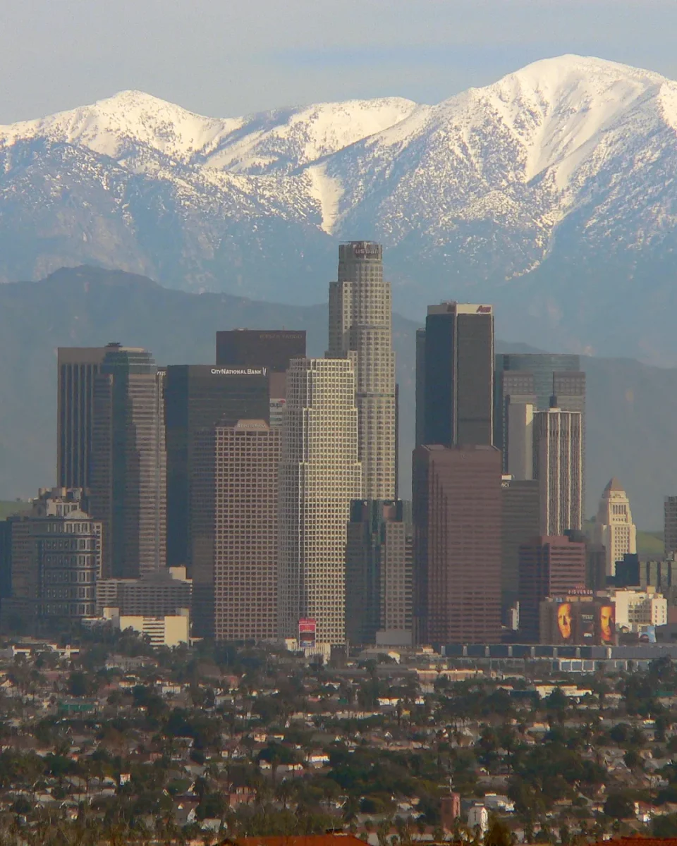 Downtown Los Angeles skyline beneath the San Gabriel Mountains