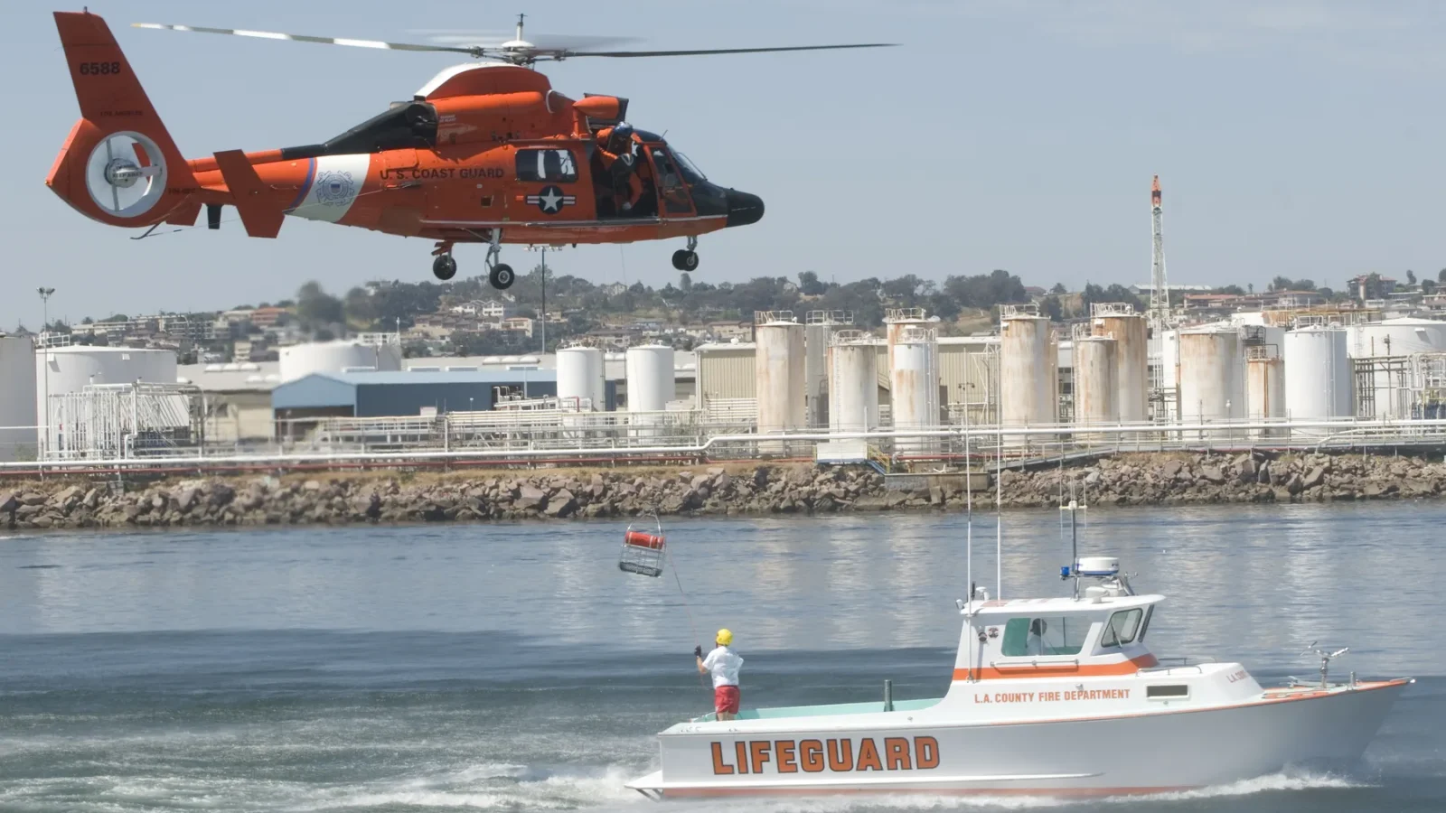 Rescue crews and a helicopter during a search-and-rescue demonstration in San Pedro