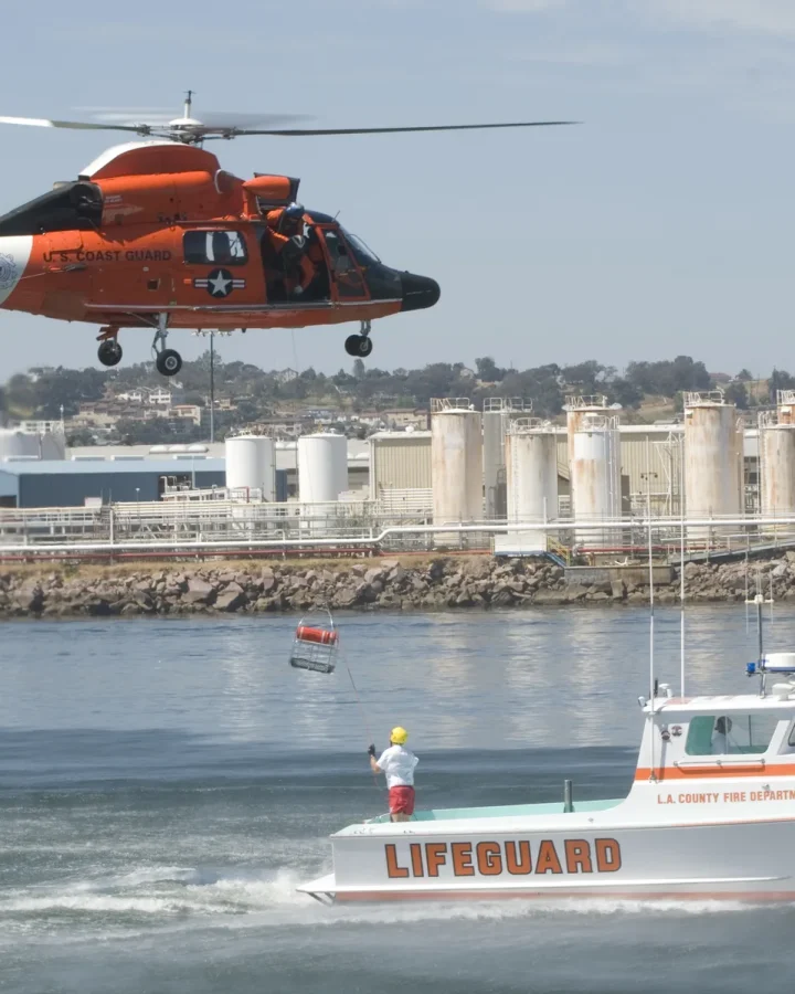 Rescue crews and a helicopter during a search-and-rescue demonstration in San Pedro